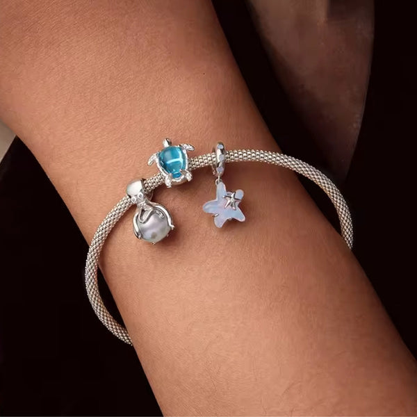 Tintenfisch Charm – 925er Silber. Ein Symbol für Anpassungsfähigkeit, Schutz & die Unterwasserwelt. Perfekt für Taucher & Meeresliebhaber. Jetzt entdecken! 🦑✨