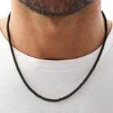 Schwarze Weizenkette aus Edelstahl für Herren, robuste Halskette mit geflochtener Struktur, maskuliner Herrenschmuck.