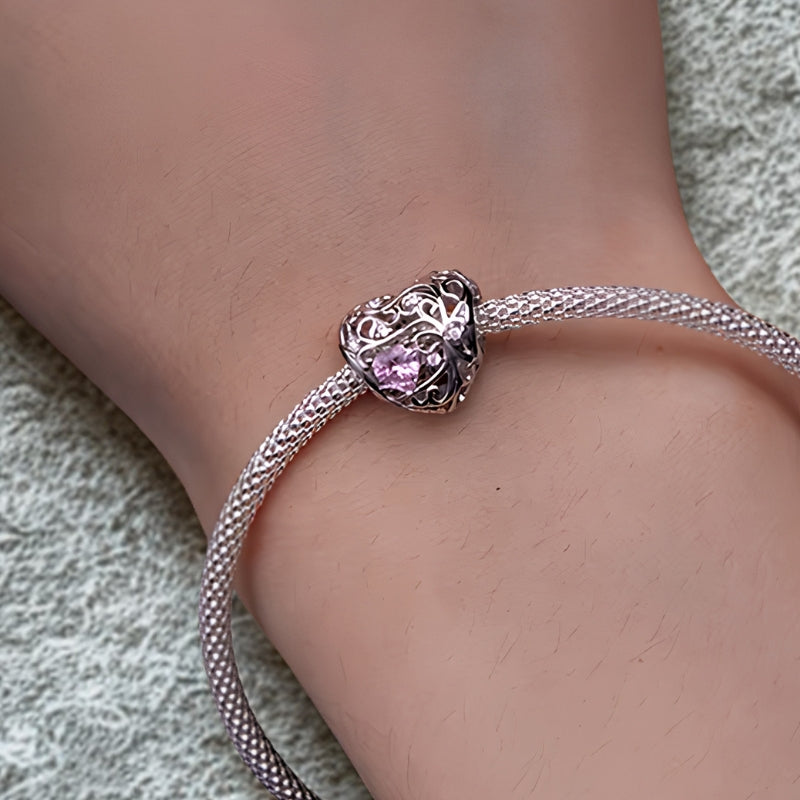 Herz Charm Anhänger aus 925er Sterlingsilber mit rosa Herz Zirkonia und funkelnden Kristallen für Charm Armband.