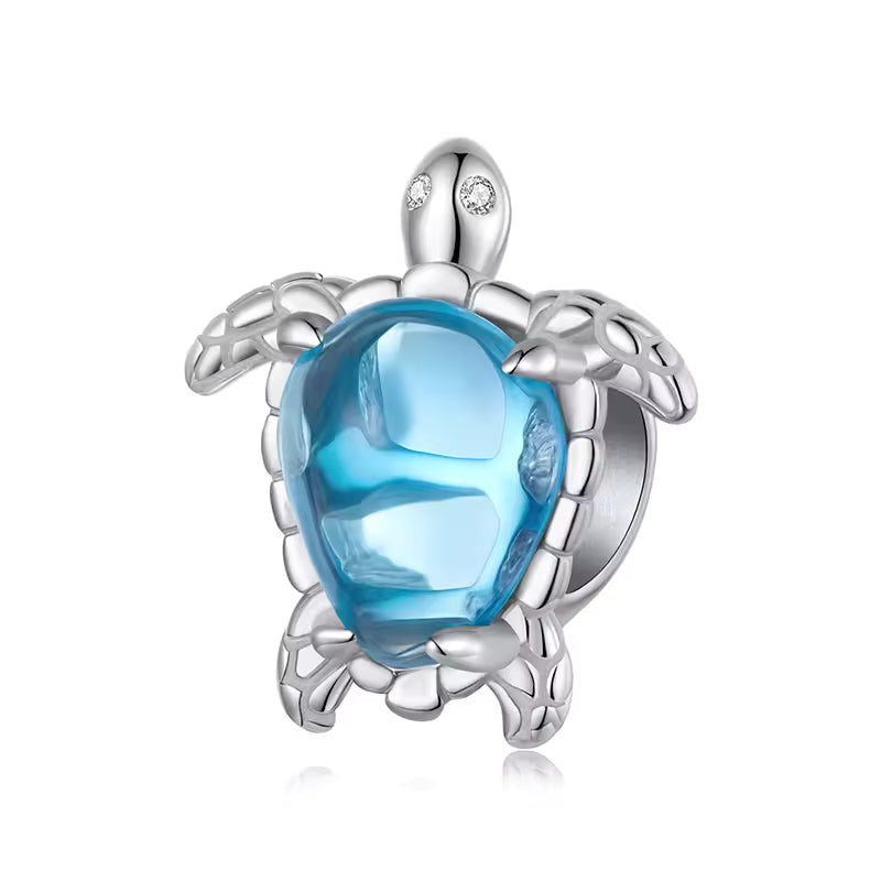 Schildkröten Charm mit filigranen Schildkrötenmotiven – inspiriert von der Unterwasserwelt. Perfekt für Taucher, Surfer & Meeresfans. 🌊🐢✨